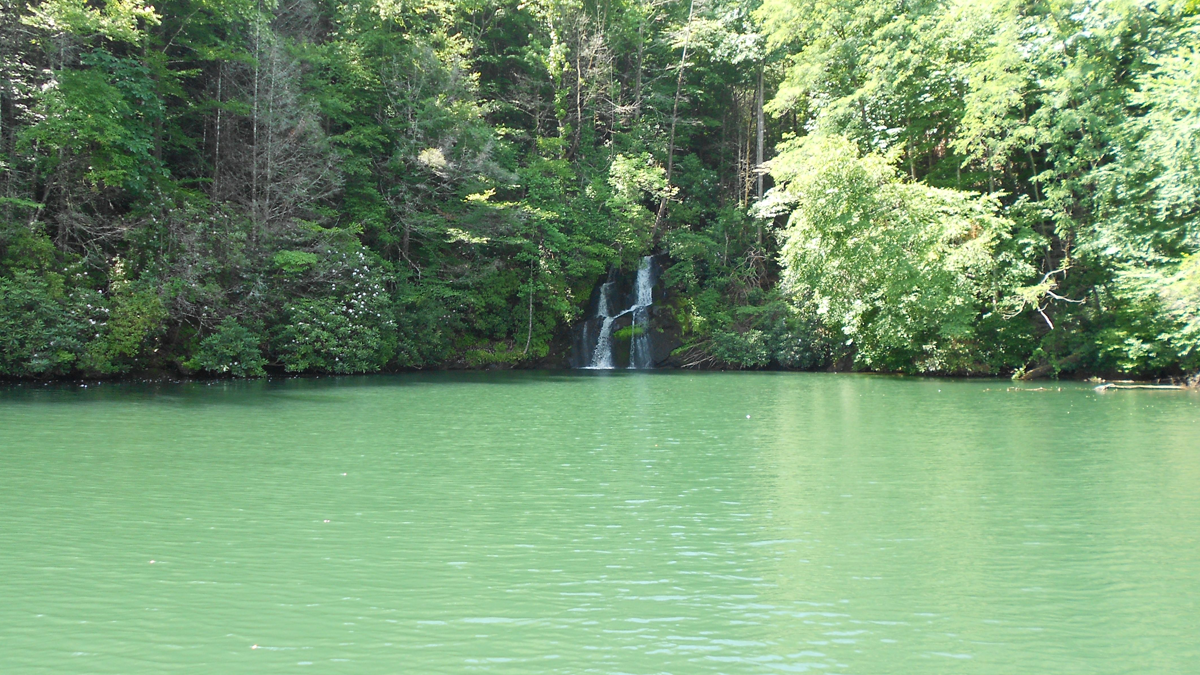 View of a waterfall on Lake Jocassee, near MakeSpace Easley, South Carolina.